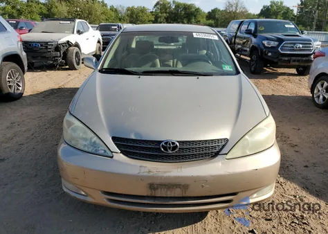 2003 Toyota Camry Le z USA, uszkodzony, nr VIN 4T1BE30K33U240567